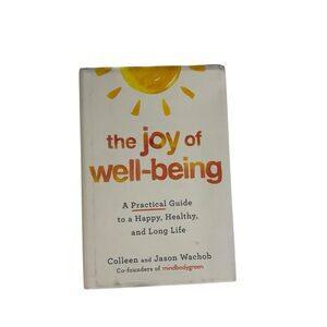 The Joy of Wellbeing hardcover book
